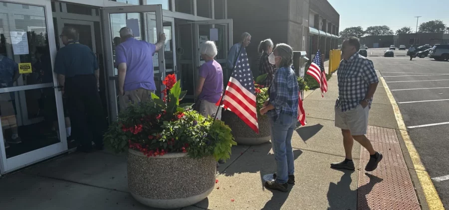 Voters line up in Columbus at Franklin County's early voting center on the first day of early in-person voting for the August special election.