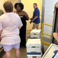 Supporters of a proposed law to regulate marijuana like alcohol in Ohio unload a U-Haul truck with hundreds of boxes of petitions to put the statute before voters in November.