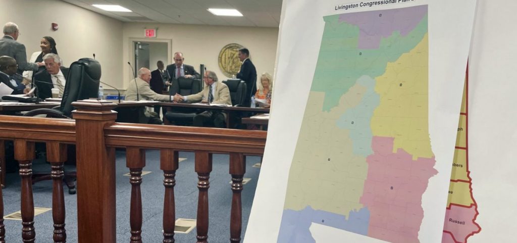 A map of a GOP proposal to redraw Alabama's congressional districts is displayed at the Alabama Statehouse in Montgomery, Ala.