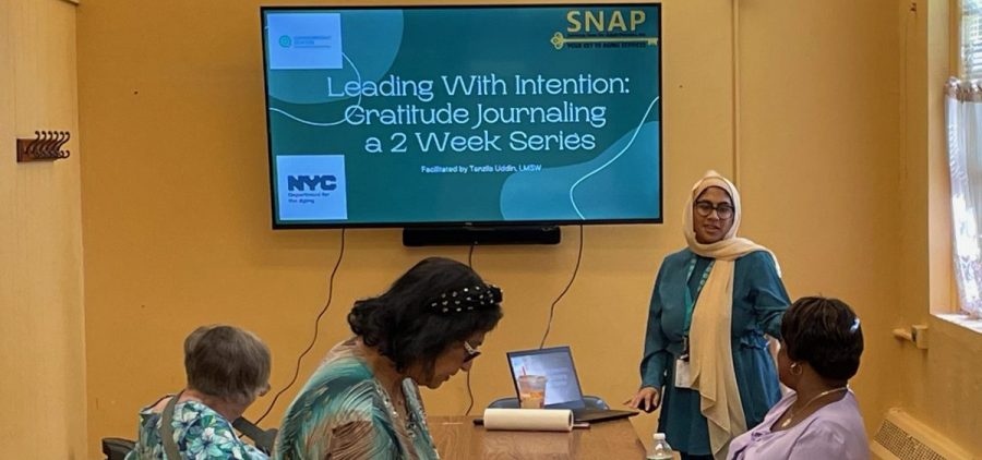 Social worker Tanzila Uddin leads a workshop on journaling at a senior center in Queens Village in NYC