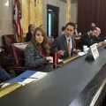 The Ohio Ballot Board sits for a meeting in a statehouse committee meeting room.