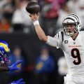 Cincinnati Bengals quarterback Joe Burrow, right, throws over Los Angeles Rams outside linebacker Byron Young during the second half of an NFL football game Monday.