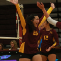 Karlee Grimm (25) celebrates a point with Kenedy Tabler (9)