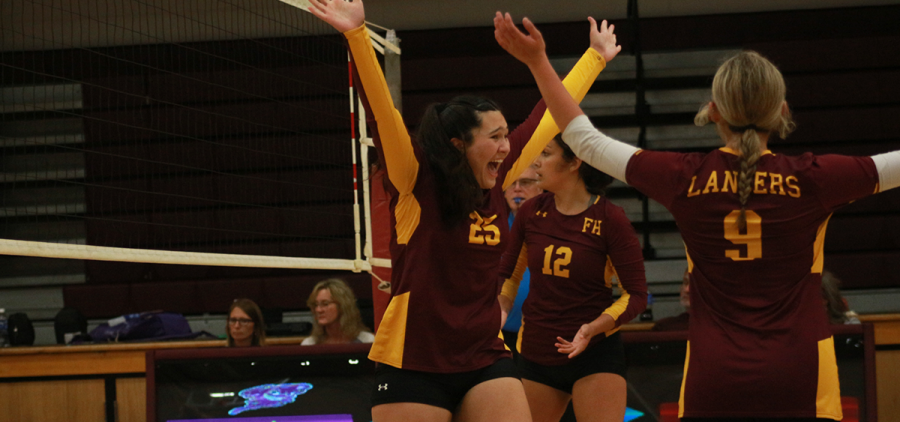 Karlee Grimm (25) celebrates a point with Kenedy Tabler (9)