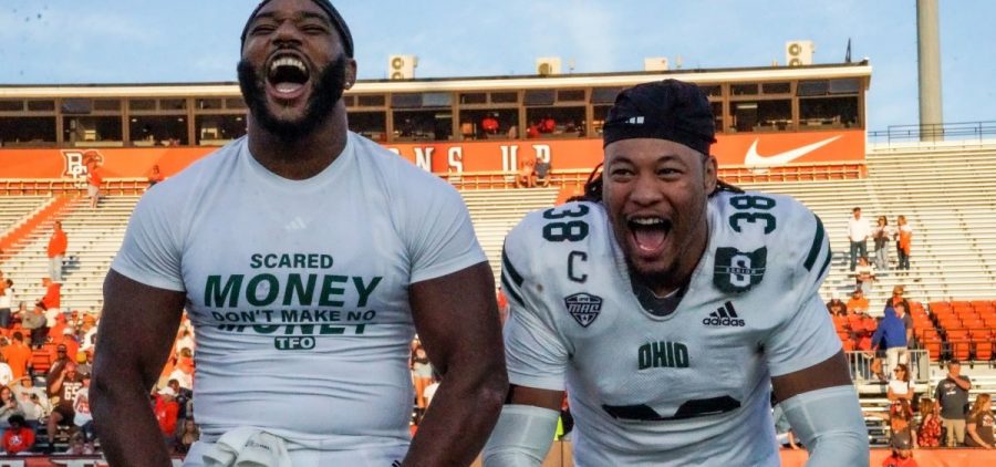 Bryce Houston and Keye Thompson celebrate after the Bobcats victory