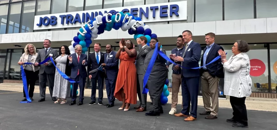 Gov. Mike DeWine (center, red tie) joins Goodwill Columbus CEO Ryan Burgess (blue tie) and Sen. Hearcel Craig (D-Columbus), Rep. Latyna Humphrey (D-Columbus) and Rep. Dontavius Jarrells (D-Columbus) in cutting the ribbon to open Goodwill's newest job training facility on Columbus' east side.