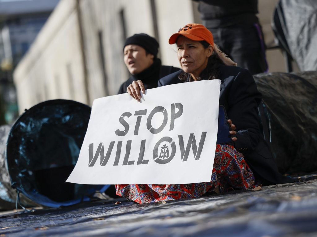 Climate activists hold a demonstration to urge President Biden to reject the Willow project