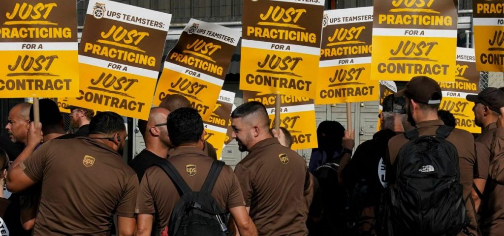 UPS workers walk a "practice picket line" in New York City on July 7, 2023.