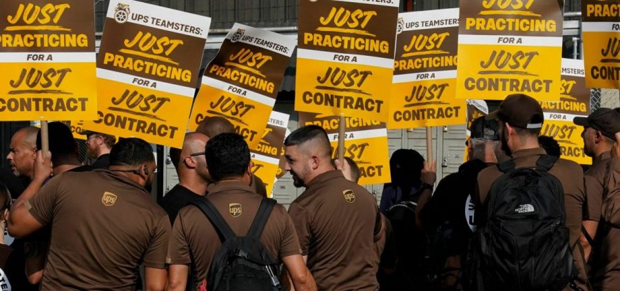 UPS workers walk a "practice picket line" in New York City on July 7, 2023.