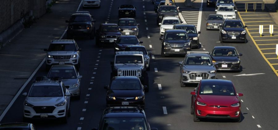Traffic moves along Interstate 395 on Friday morning in Washington, D.C.