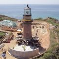drone view of the historic Gay Head Lighthouse in Martha's Vineyard looking towards ocean