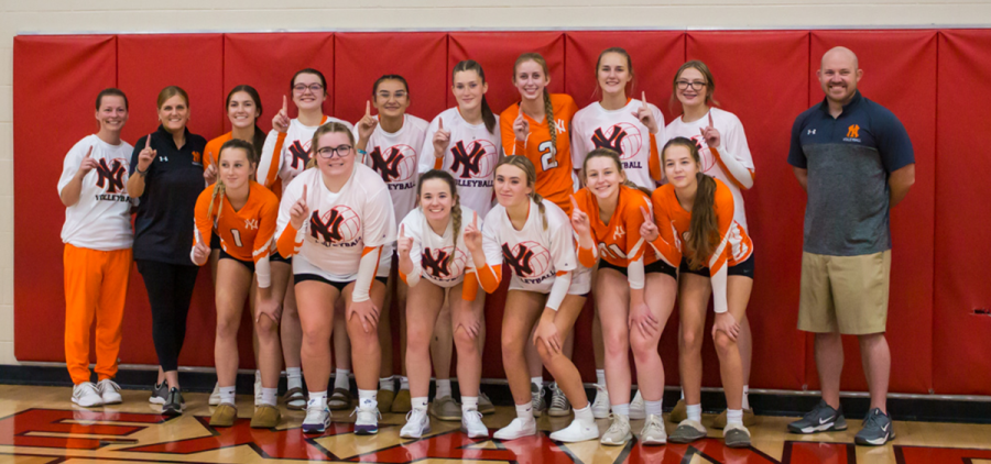 High school girls volleyball: Nelsonville-York poses for a team photo after winning the TVC Ohio title
