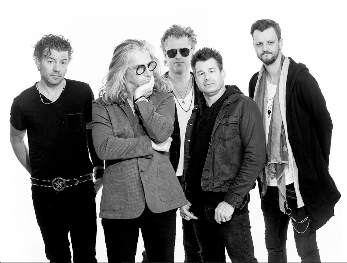 A promotional image of Collective Soul. It is in black and white. 
