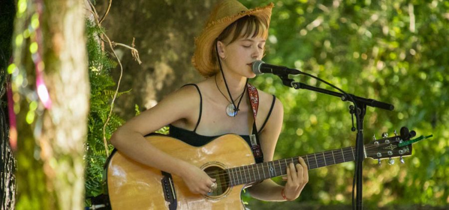 An image of coralilly performing at the 2023 Nelsonville Music Festival.