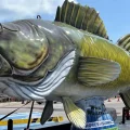 Wylie the Walleye, Port Clinton's 600-pound fiberglass walleye mascot, is situated in a town square, where tourists can take selfies with it.