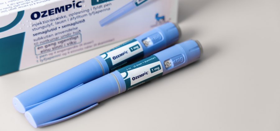 Two Ozempic Insulin injection pens next to an Ozempic box.