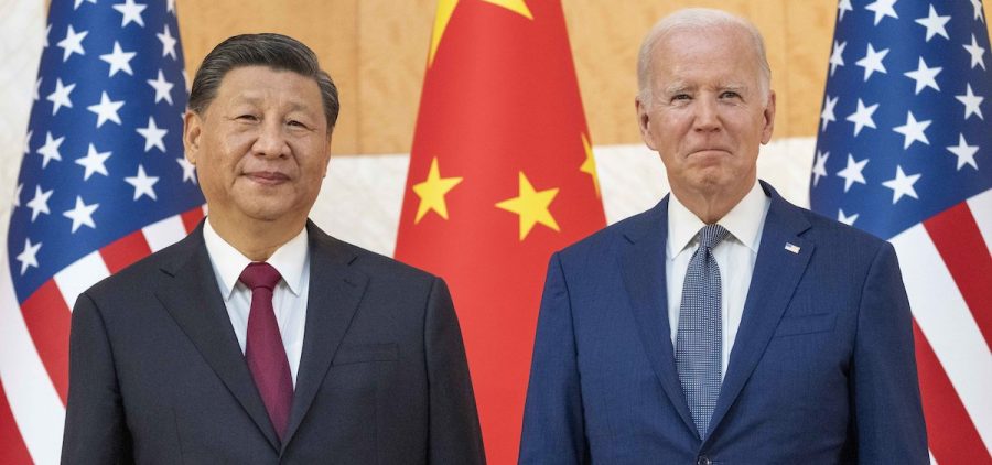 U.S. President Joe Biden, right, stands with Chinese President Xi Jinping before a meeting on the sidelines of the G20 summit on Nov. 14, 2022, in Bali, Indonesia. When Washington and Beijing do economic battle – as they have for five years now – the rest of the world suffers, too. And when they hold a top-level summit – as Biden and Xi will this week – the rest of the world pays attention.