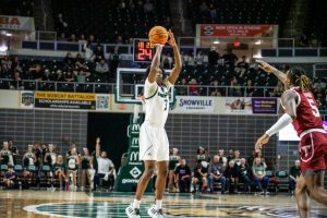 Ohio sophomore guard AJ Brown (3) shoots a three in Ohio's game against the Troy Trojans. 