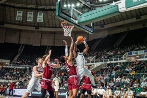 Ohio sophomore guard Elmore James (1) shoots a contested layup for Ohio in its game against the Troy Trojans. 