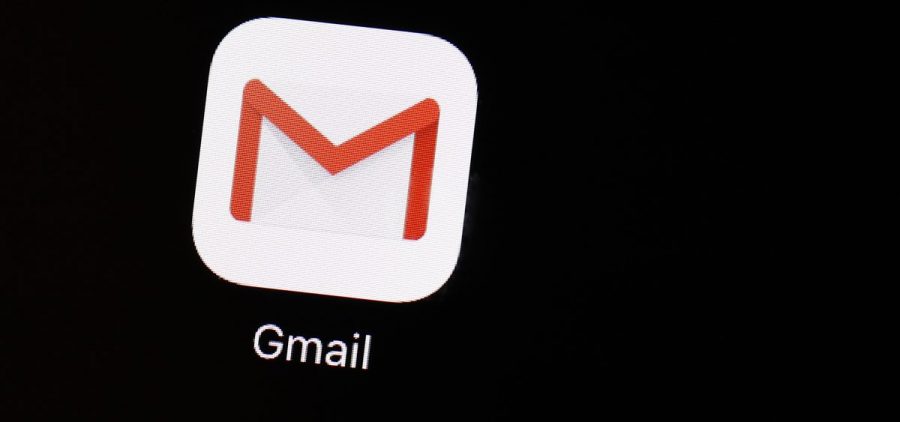 The Gmail logo on a black phone screen.