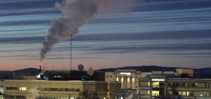 A plume of smoke being emitted into the air from a power plant, Feb. 16, 2022, in Fairbanks, Alaska.