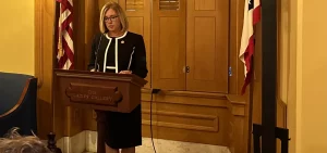 Rep. Cindy Abrams proposes diverting some marijuana tax revenue toward police training during a press conference in November 2023.