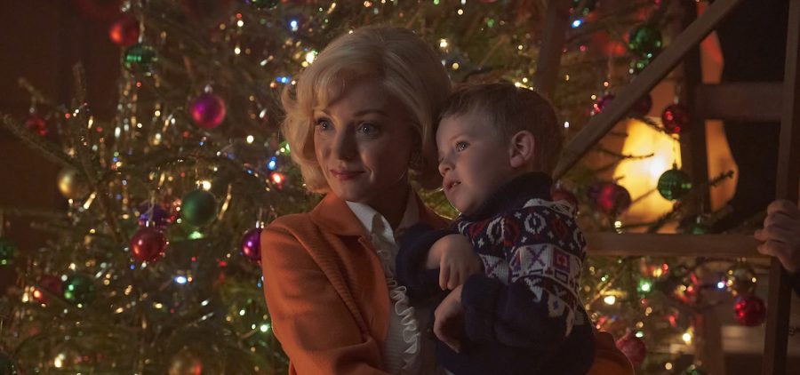 Trixie Franklin (HELEN GEORGE) and child Jonty Aylward (ARCHIE O'CALLAGHAN) in front of Christmas tree
