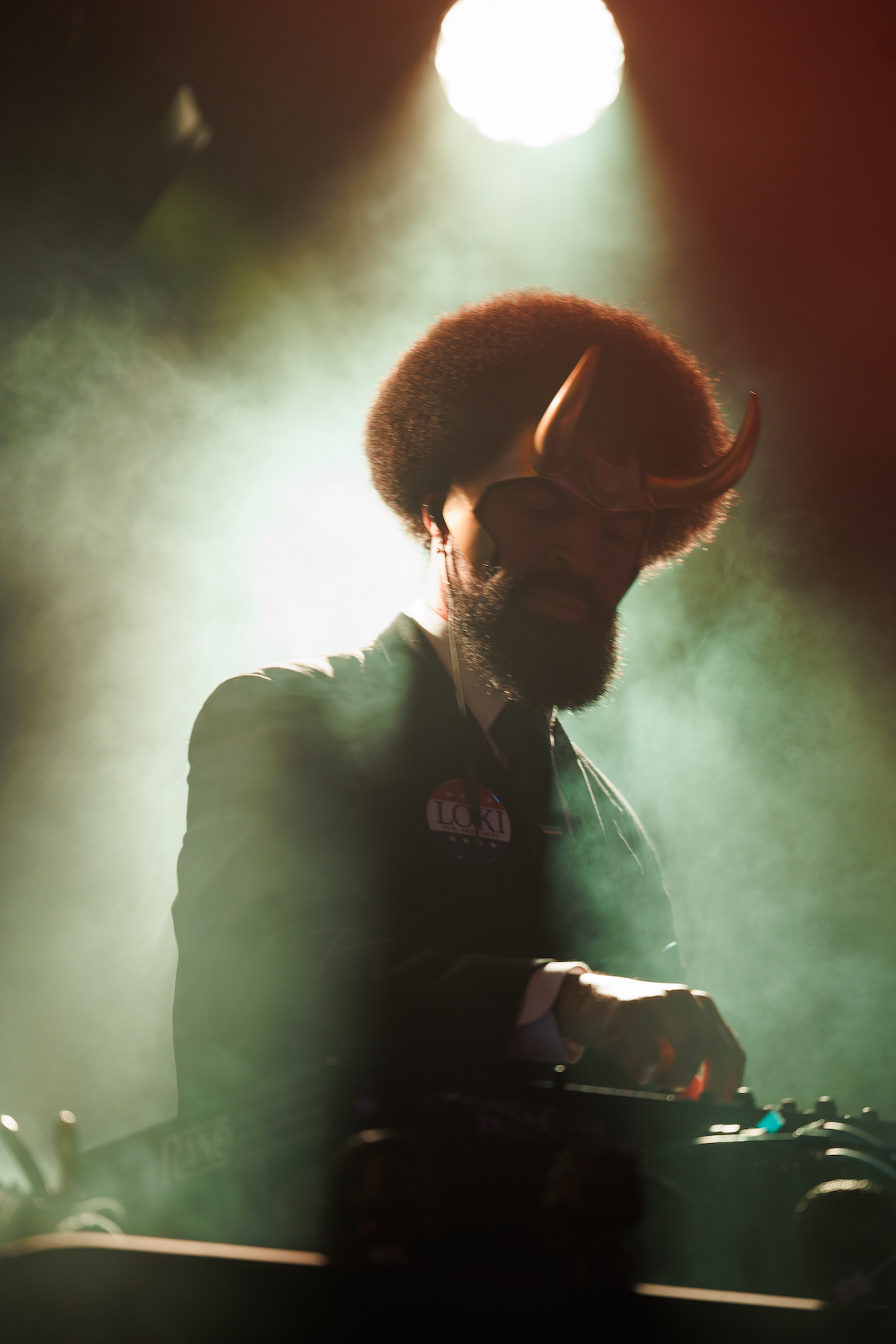 A promotional image of DJ B-Funk performing at HallOUween 2023. 