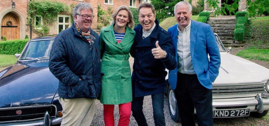 Funny-man Brian Conley and broadcaster Nick Owen with two antiquer's in front of classic cars