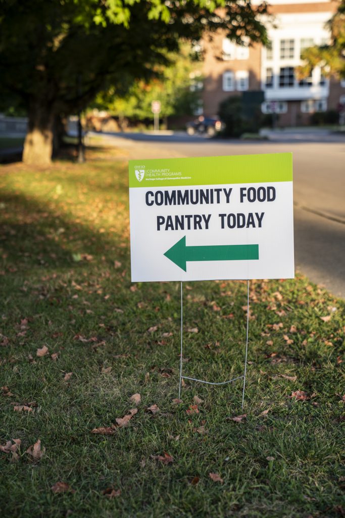 An image of a sign that reads Community Food Pantry Today