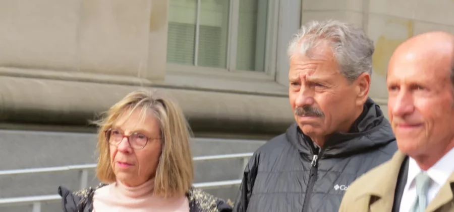 Sam Randazzo leaves federal court in Cincinnati accompanied by his wife and his lawyer Roger Sugarman.