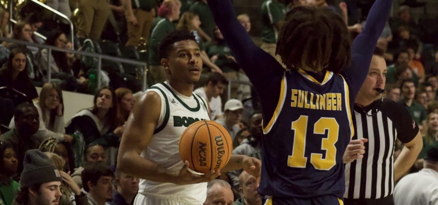 Ohio guard Jaylin Hunter (12) inbounds the ball against the Kent State Golden Flashes.