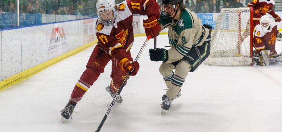 Luc Reeve goes after the puck against Iowa State