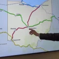 MORPC Executive Director William Murdock points to a map with proposed Amtrak expansion in Ohio