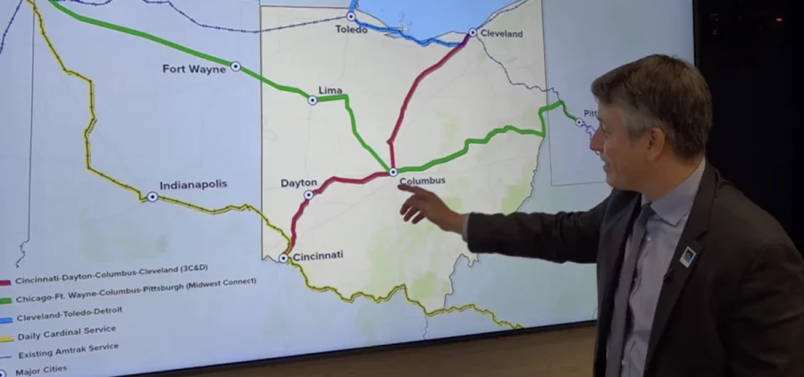MORPC Executive Director William Murdock points to a map with proposed Amtrak expansion in Ohio