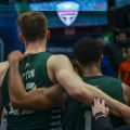 AJ Clayton and Jaylin Hunter hug on the court after Ohio's loss in the MAC Tournament Semifinals