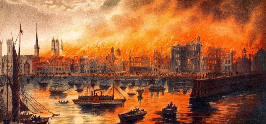 A painted image of The Great Chicago Fire of 1871. Boats seen in the water while the city is ablaze.