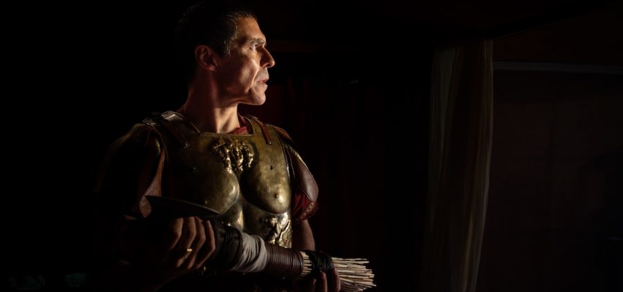 Caesar (Andonis Anthony). Caesar in armor, quiver of arrows in his hand Credit: Richard Pearson, BBC Studios