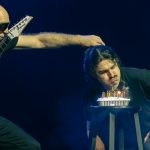 Joe Satriani holds Rai Thistlethwayte's hair as he blows out his birthday candles at the Andrew J. Brady Center April 19, 2024. 