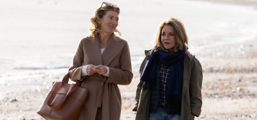 Shown L-R: Eve Best as Rosaline; Stockard Channing as Cathy, two 40-something sisters walking along the beach in warm overcoats