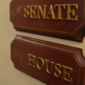 Wooden signs point to the Senate House in the Ohio capitol.