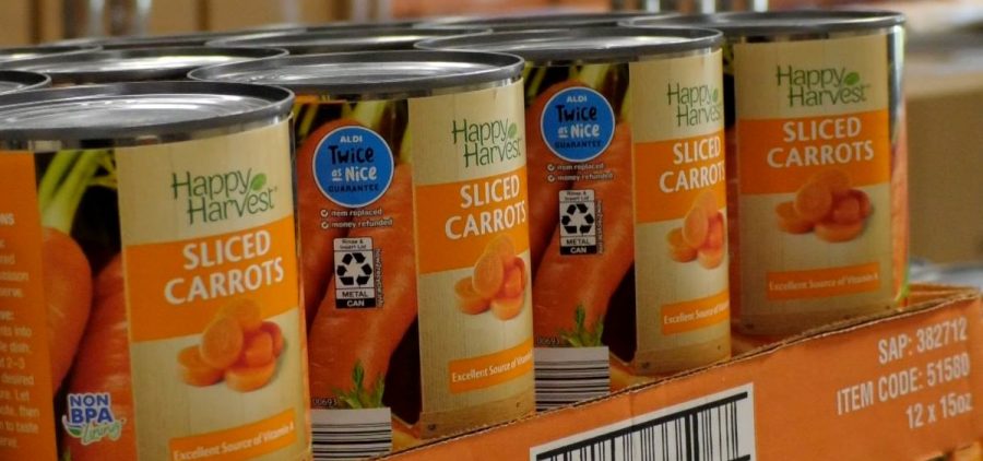 cans of sliced carrots on shelf at the Athens County Food Pantry.