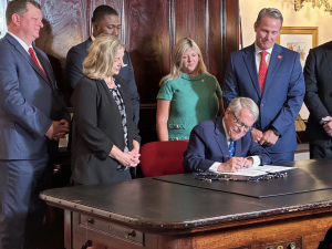 Governor Mike DeWine signs a $3.5 billion infrastructure bill.