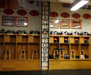16 rung ladder inside the Wheelersburg football locker room. Each rung has the name of the team they face that week on it.