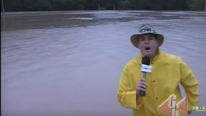 Mark Bruce standing in flood water