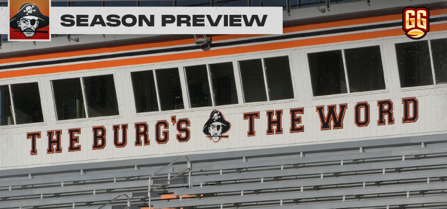 Lettering above the bleachers at Ed Miller Stadium that says "The Burg's the word"