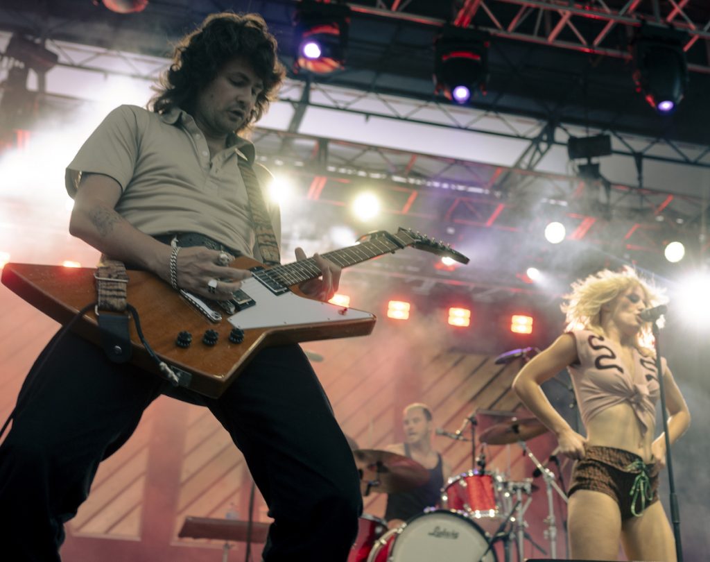 Declan Martens sets his six string on fire with the heat of a guitar solo during Amyl & The Sniffers set at the 2024 Nelsonville Music Festival on Friday, July 26, 2024.