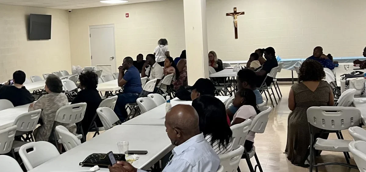 Haitian people gathered at St. Rose's community center in Lima to learn about English language learning options in the northwest Ohio city.