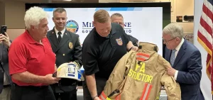 The Ohio Fire Academy gifts Gov. Mike DeWine an instructor jacket with his name.