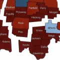 A map of Ohio counties shows how they vote in elections with red and blue indicators